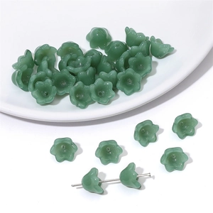 Macro detail of lily of the valley beads for DIY handmade jewelry crafts