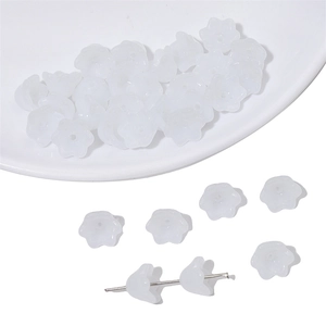 Detailed close-up of translucent white lily of the valley beads for DIY jewelry making