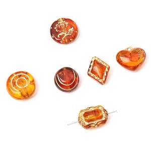 Vintage amber acrylic beads with gold embossed floral patterns for DIY jewelry making