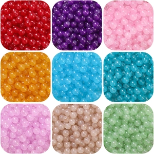 Detailed grid of colorful round glass beads for handmade DIY jewelry and craft making