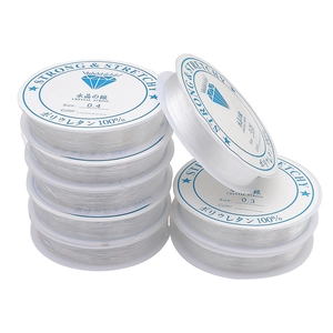 Stack of 0.25mm to 0.4mm transparent crystal elastic strings for DIY jewelry making