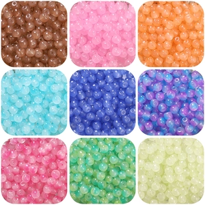 Colorful cat-eye glass beads in nine vibrant shades for DIY jewelry making and crafts