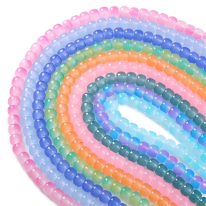 Polished cat eye glass beads in vibrant colors for DIY jewelry making and handmade crafts