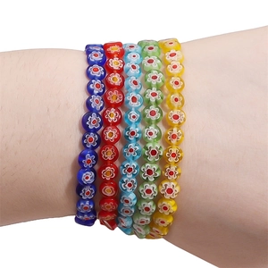 Colorful Millefiori glass beaded bracelets featuring handmade floral patterns on five strands