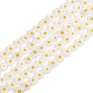 Macro view of handmade millefiori glass flower beads for DIY jewelry making