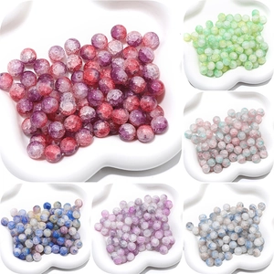 Close-up detail of multi-colored cracked glass beads for DIY jewelry making