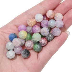 Close-up of colorful crackle glass beads for DIY jewelry making and handmade necklaces