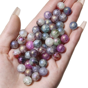 Detail of aurora blue crackle glass beads for DIY jewelry bracelets and necklaces