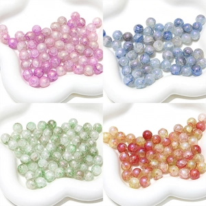 Macro shot of 8-10mm aurora blue crackle glass round beads for DIY jewelry making