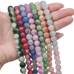 Macro shot of colorful aurora blue cracked glass beads for DIY bracelet jewelry making