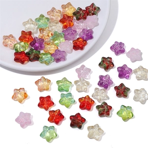 Macro shot of colorful star-shaped glass beads for DIY jewelry and hair accessories
