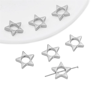 Macro shot of silver star-shaped CCB beads with functional hole for DIY jewelry making