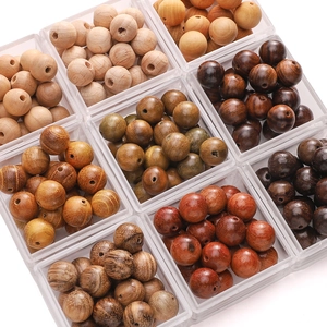 Assorted natural wooden beads in various textures and colors for DIY jewelry making