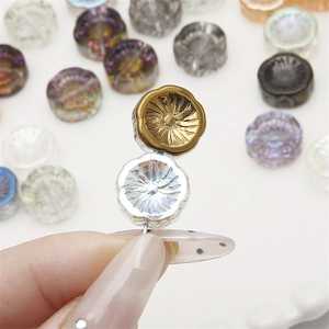 Iridescent glass flower beads for DIY jewelry making in metallic gold and silver colors