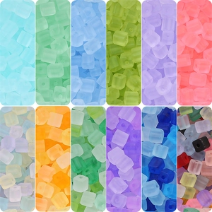 Macro detail of frosted square sugar beads in macaron colors for DIY jewelry making
