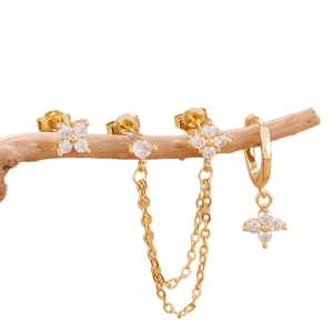 Gold stainless steel floral earring set featuring zircon studs and elegant chain tassels