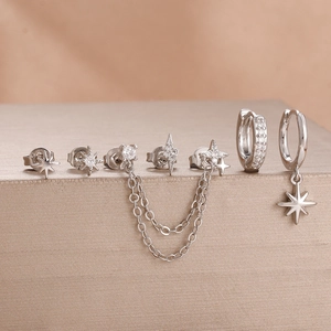 Silbernes Piercing-Set mit Stern- und Blitzsteckern, Kettenohrringen und Zirkonia