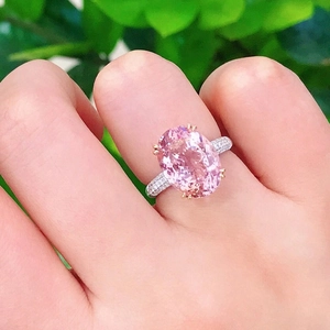 Luxury pink zircon ring with oval morganite gemstone and pave diamond setting