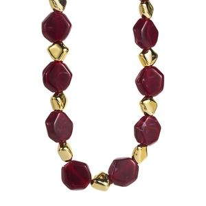 Close-up of burgundy faceted resin beads and irregular gold polished metal beads