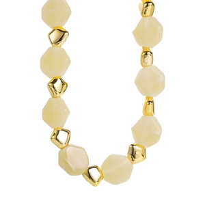 Macro detail of fashionable colorful beaded necklace with yellow faceted resin and gold beads