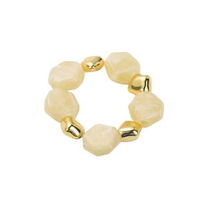 Detail of cream resin irregular beads and gold geometric metal links on the stretch bracelet