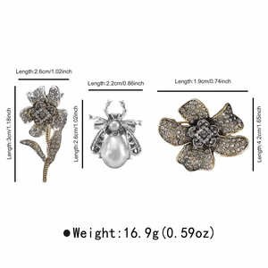 Detailed view of rhinestone flower and bee brooches with precise dimensions and weight