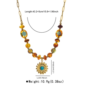 Close-up of beaded necklace with sunflower pendant and detailed size measurements