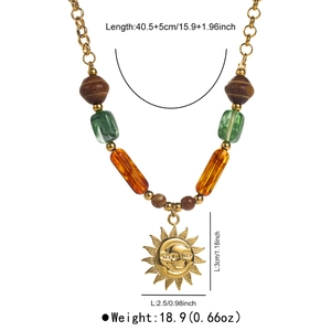 Detail showing dimensions of celestial sun moon pendant on vintage beaded chain