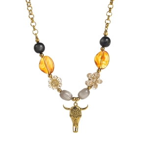 Bohemian gold chain necklace with colorful beads and a detailed bull skull pendant