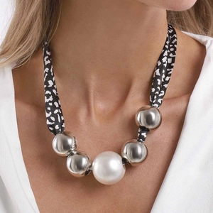 Chic leopard print silk scarf necklace with metallic silver beads and a large white pearl