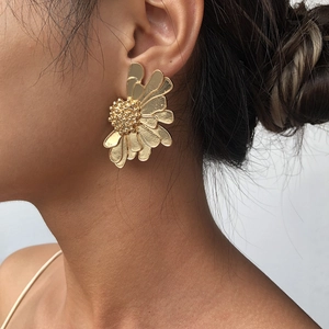 Elegant oversized gold floral stud earrings with textured matte finish for women