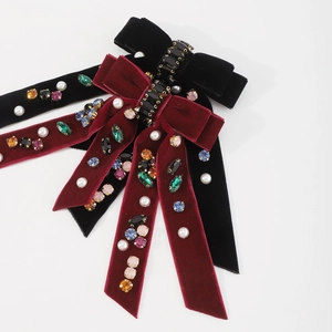 Retro velvet bow hair clips in black and wine red with shimmering crystals and white pearls