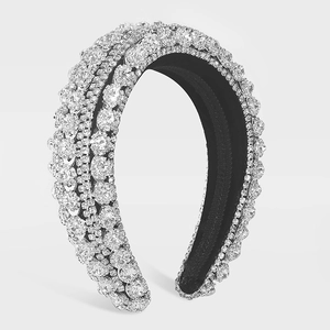 Macro shot of luxury wide headband with shimmering rhinestones and dense crystal detailing