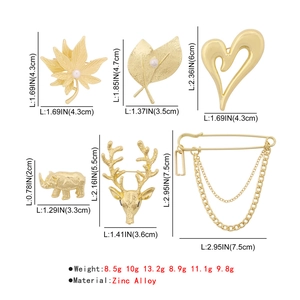 Detailed size chart for zinc alloy brooches including elephant heart and leaf designs