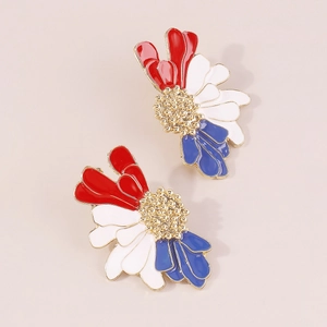 Detail of red white and blue floral earrings with gold enamel and beaded center
