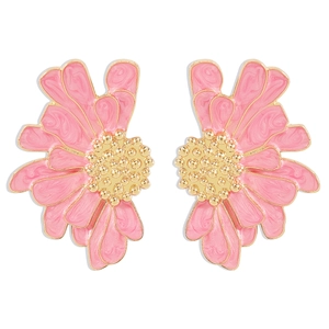 Detailed macro view of pink enamel flower earrings with textured golden metallic edges