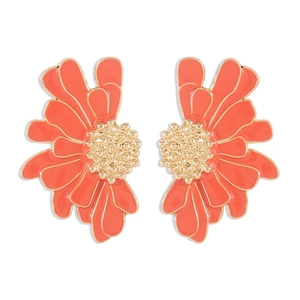 Detailed macro view of coral orange enamel flower earrings with golden textured metal finish