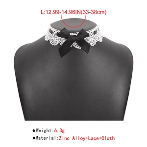 White floral lace choker with black ribbon bow showing size 33-38cm and 6.3g weight