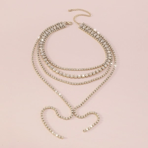 Close-up of luxury multi-layer gold rhinestone fringe necklace for evening party