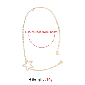 Detailed view of golden butterfly body chain with crystal star pendant measurements