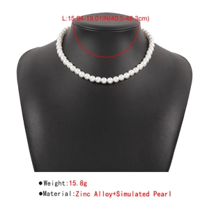 Detail showing the adjustable length and precise weight of this pearl choker necklace