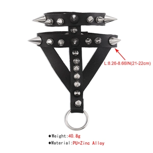Detail of gothic punk PU leather thigh ring with silver rivets and O-ring pendant