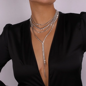 Close-up of layered silver rhinestone choker with shimmering fringe for party wear