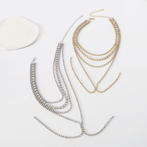 Detailed macro view of the luxurious layered rhinestone tassel choker with tennis chain style