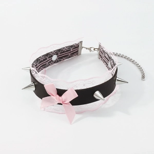 Detail of punk black leather choker with pink lace, bow and silver metal spikes