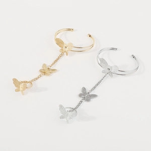 Detailed butterfly slave bracelet with filigree hand chain and ring in gold and silver