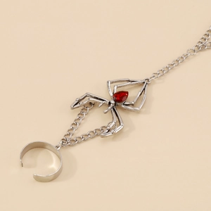 Gothic silver spider slave bracelet with a red teardrop crystal and finger ring
