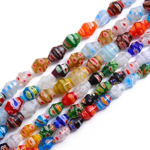 Macro view of multi-colored Millefiori glass beads with floral patterns for DIY jewelry