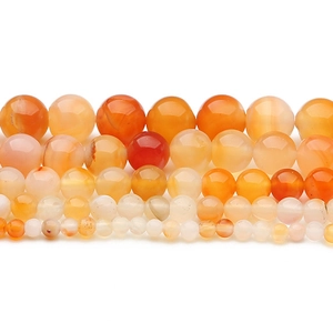 Perle in agata rosa naturale in varie dimensioni con trama sfumata arancione-rossa lucida