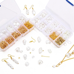 Complete DIY sieradenset met ABS parels en goudkleurige accessoires in transparante doos